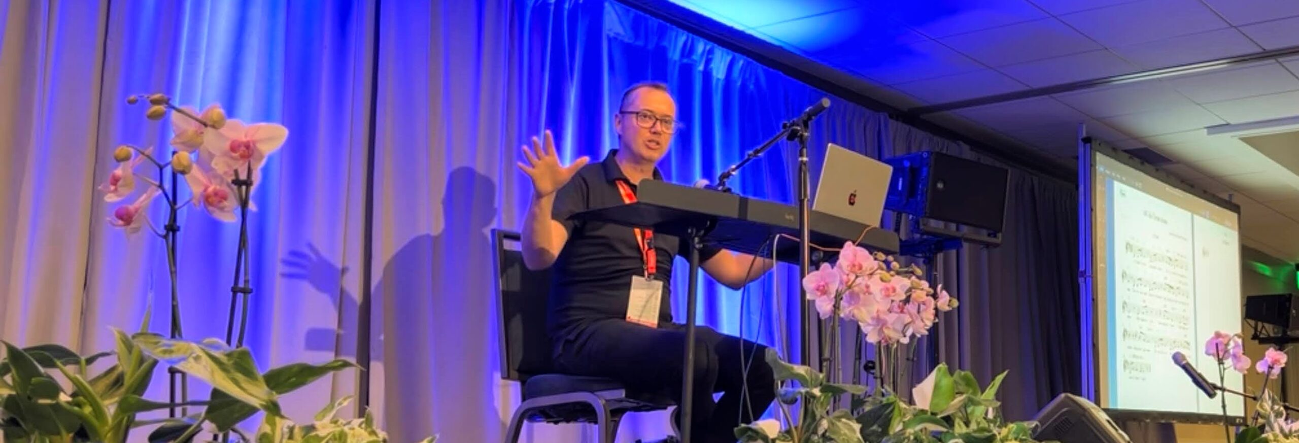 John presenting at Sing!