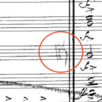 A faint conductor's marking reminding us of the tenor clef, last seen pages ago...